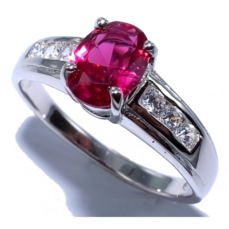 Bague argent 2,4g rhodié t 50 à 60 zircon et rubis synthétique